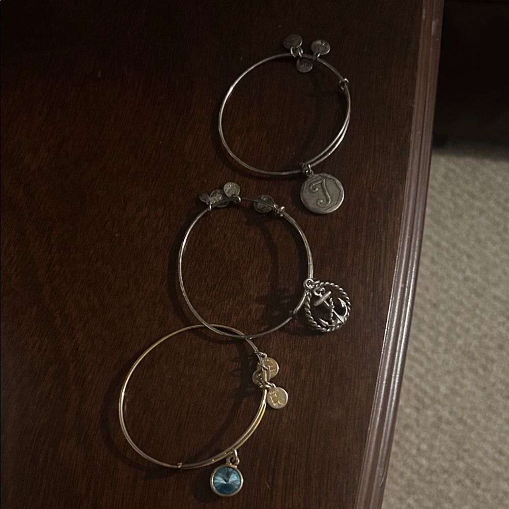 Alex and Ani Gold Bracelet with Blue Charm